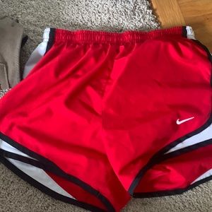 red nike shorts